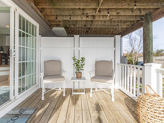 Private outside patio with grill. Entrance into Beach Bay Getaway.