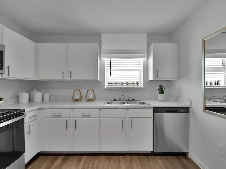 Enjoy the modern elegance of the spacious kitchen at Esperanza at Wild Orchid. With sleek countertops, ample storage, and state-of-the-art appliances, it's perfect for culinary enthusiasts. Schedule your tour today and elevate your living!
