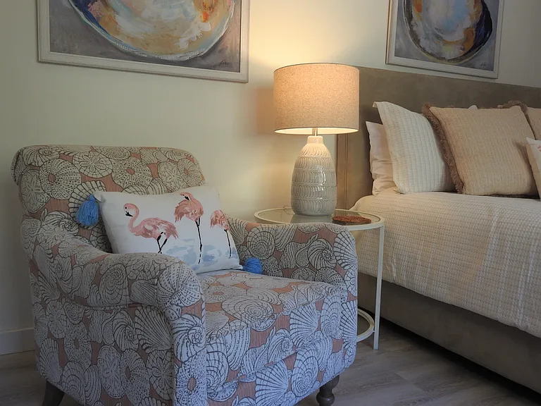 A place to grab a book and have a moment in the guest room.