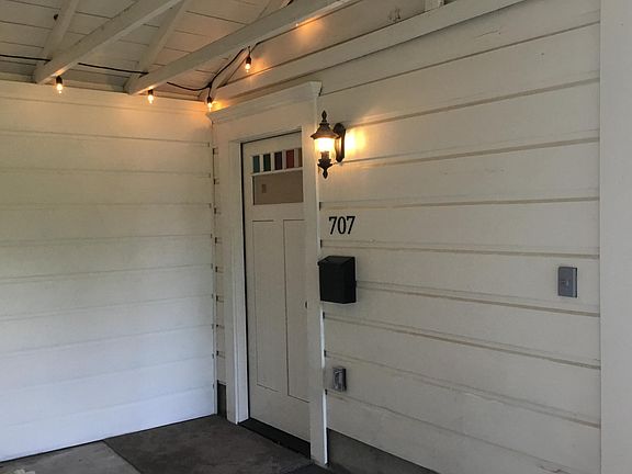 Custom made front door from covered area