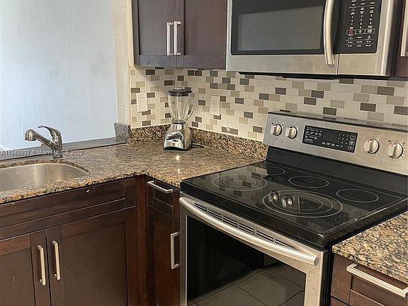 5th image of 870 NE 207th Ter APT 101-9