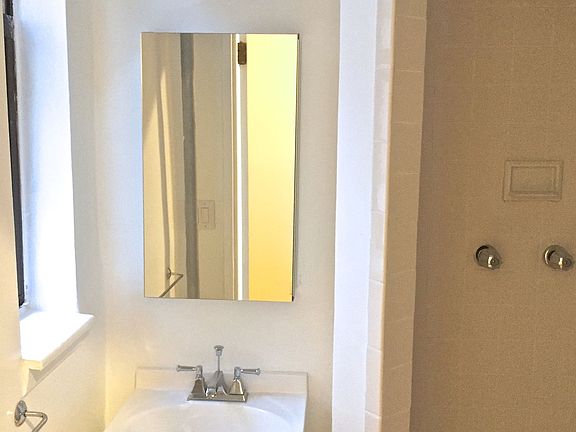5th image of 339 E 12th St APT 13