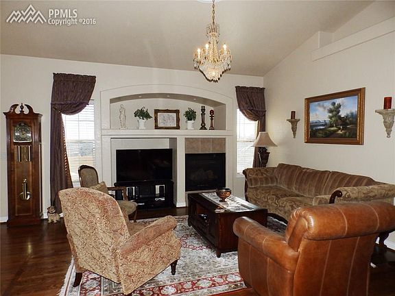 Formal dining room with soaring ceilings