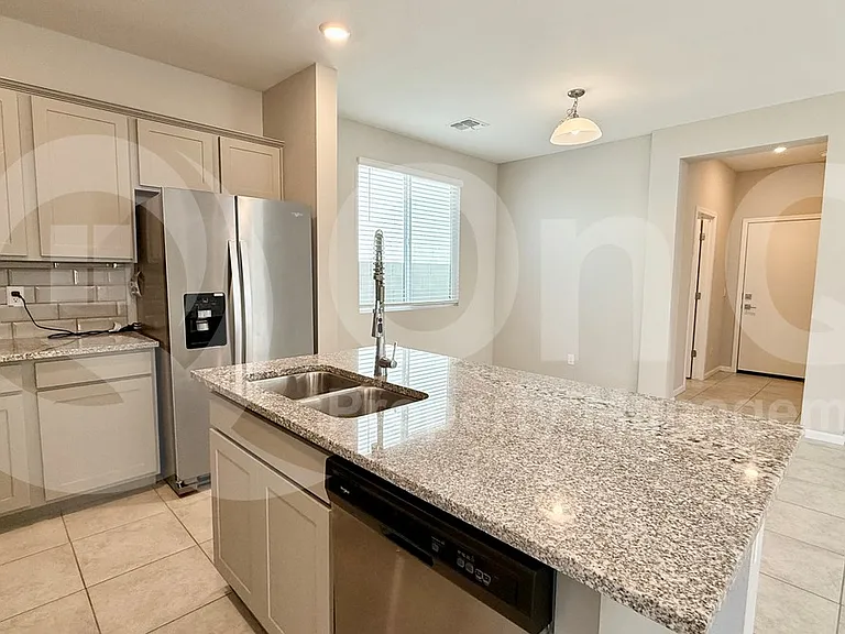 17381 W Daley Ln — Photo 3