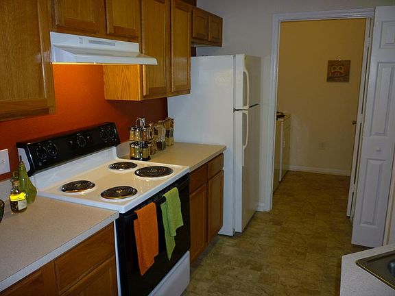 Kitchen with Laundry Room in the Background
