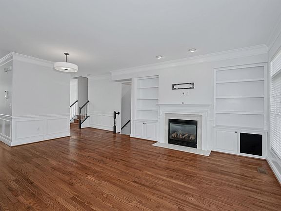 Custom Bookcases Flanking Fireplace