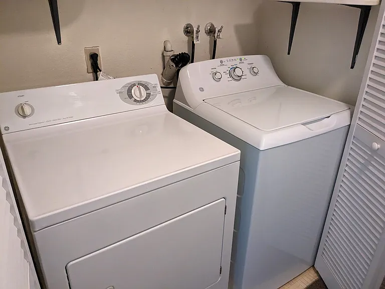 Full size washer and dryer in the hall