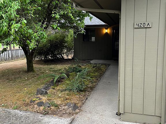 Front private entry shows stoop large enough for small table and chairs.