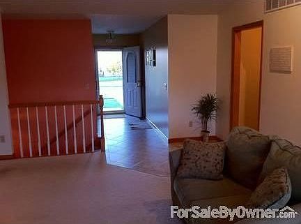 New tile floors
						:
						New tile floors wrapping from front entrance all the way through kitchen