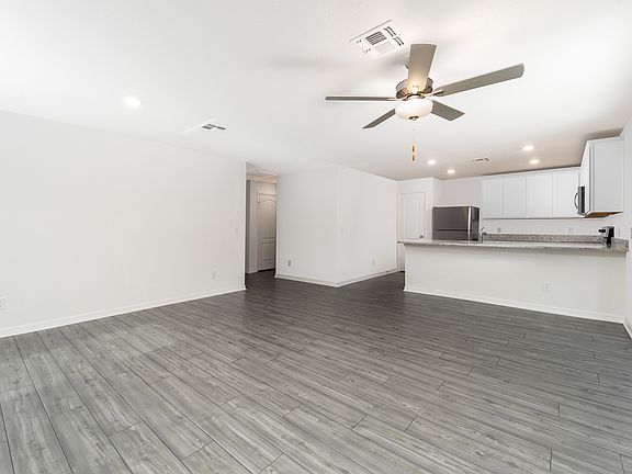 Enjoy entertianing family and friends with this open-concept living area.