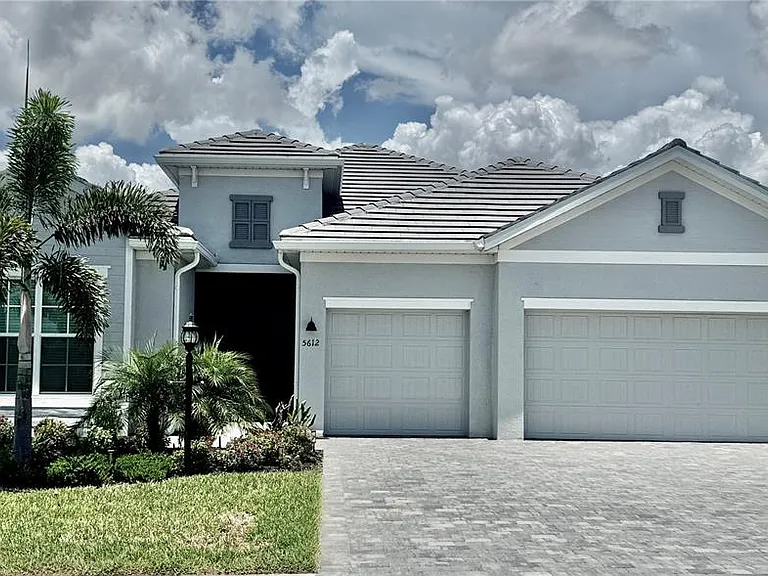 5612 Lightning Whelk Ln — Photo 1