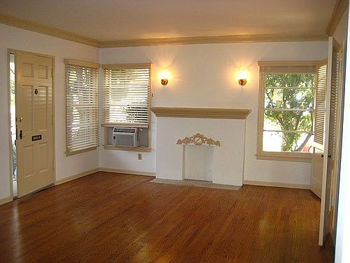 Living Room with Faux Fireplace and Mantle