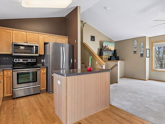 Stainless steel appliances and island.