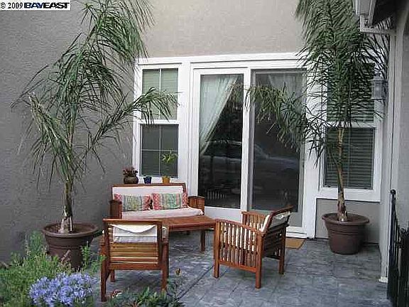 Side patio to dining room 