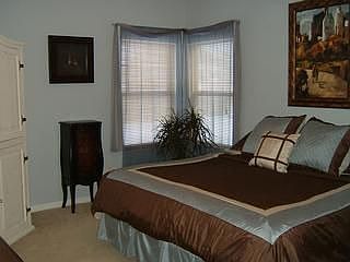 First floor master bedroom with attached master bath and a garden tub.