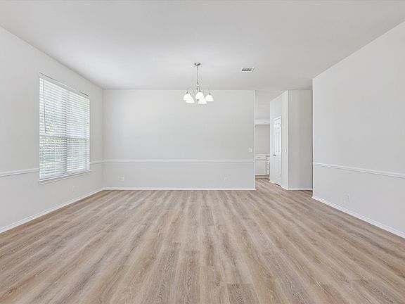 Walk in to your spacious formal living and dining room. This room could have multiple uses.