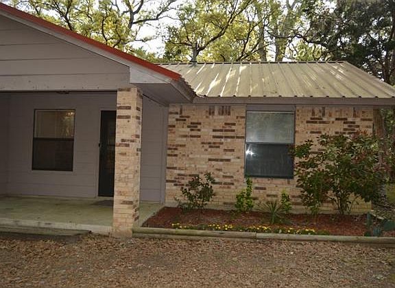 Covered patio and area for flowers etc.