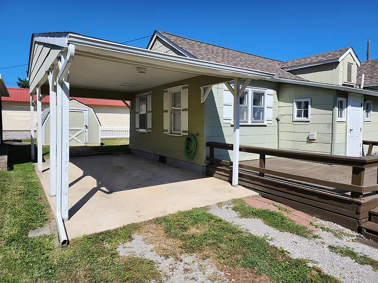 Outside of House with Carport.