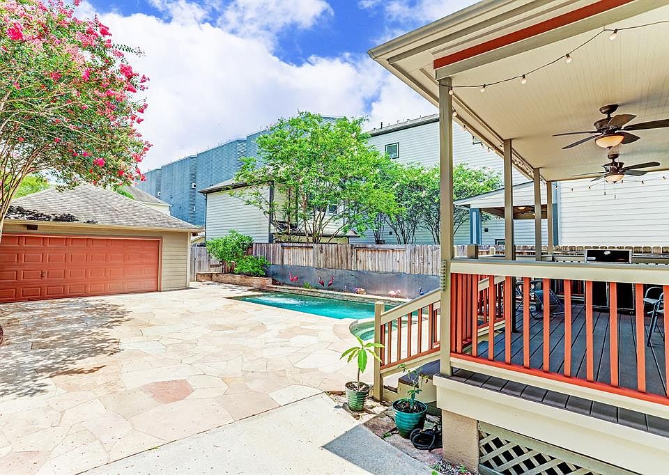 Welcome to 919 W 24th St - a rare opportunity in Shady Acres with 3BD/2.5BA, a private driveway and a fruit tree lined pool to be your new oasis!