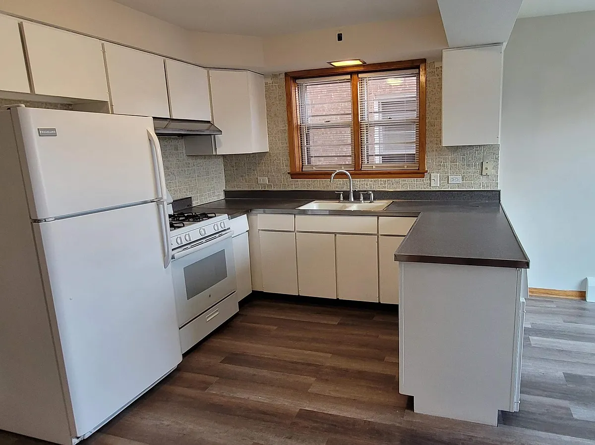 Building Photo - 7647 W Addison St #1