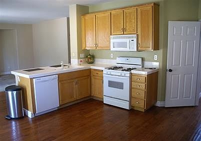 New microwave, large double door refrig. gas stove, dishwash
