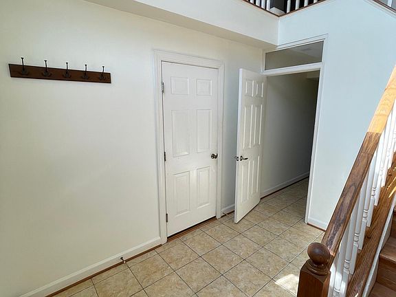Entrance way. Door to garage and hall to main floor bedroom and bathroom.