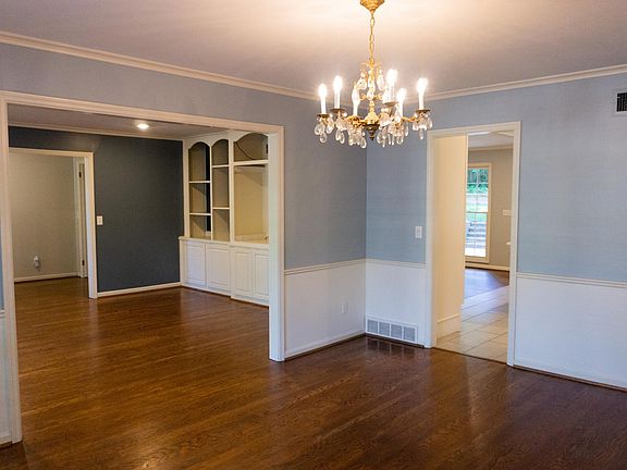 View from dining room to office and front entry.