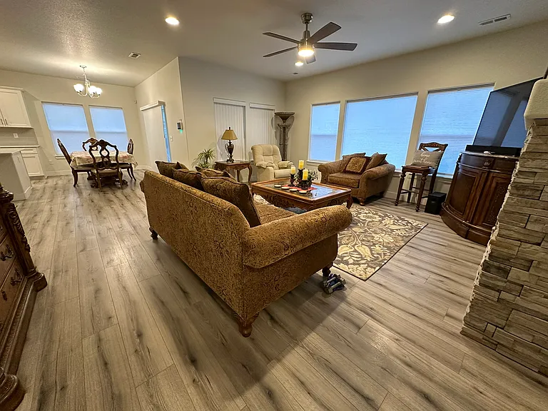 Living room with fireplace and spectacular views of the mountains