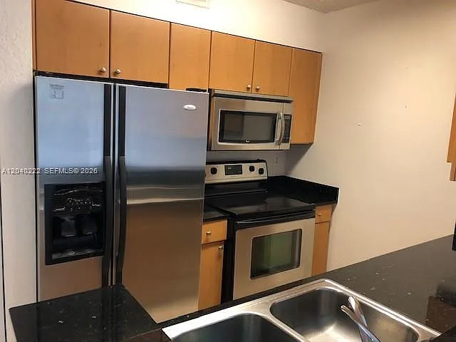2811 N Oakland Forest Dr #105 — Photo 4