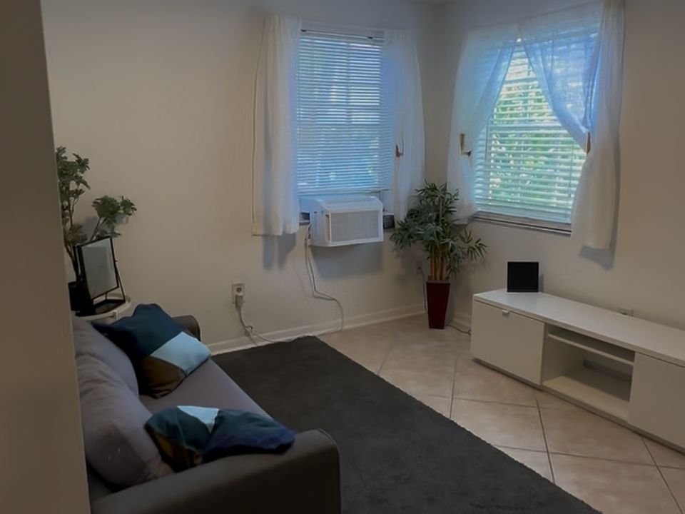 Another view of the living room which shows how much natural light the apartment gets!
