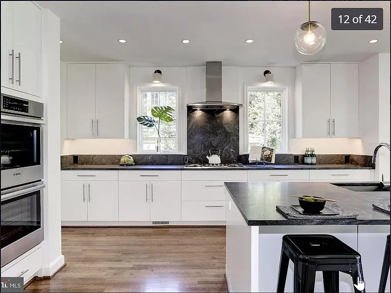 Modern kitchen with stainless steel appliances and ample storage