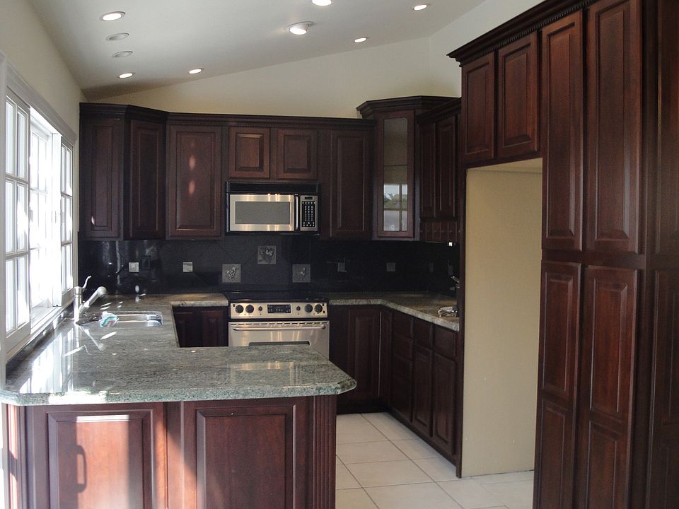 Cherry wood kitchen cabinets