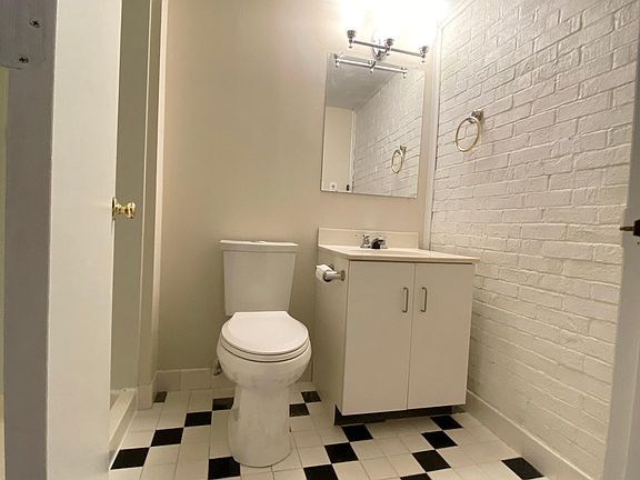 Full bathroom with stand up shower.