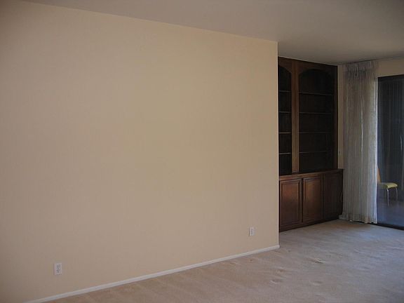 Built shelving are a bonus in the huge livings room