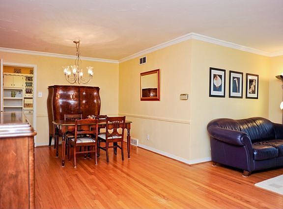 Refinished floors and new paint.  Notice the beautiful crown molding