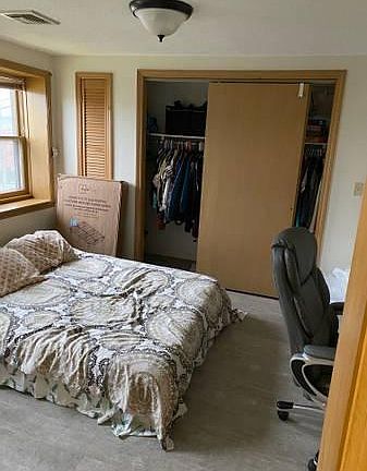 Bedroom 2 w/ closet and built in shelves