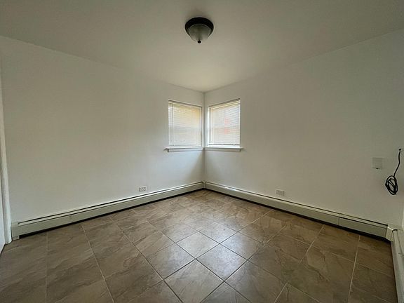 3rd image of 7722 W Belmont Ave APT Gn