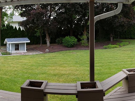 Patio and partially covered deck
