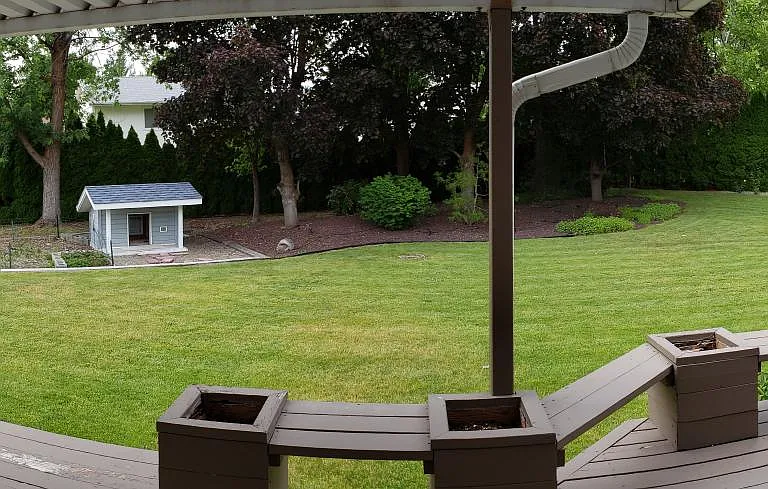 Patio and partially covered deck