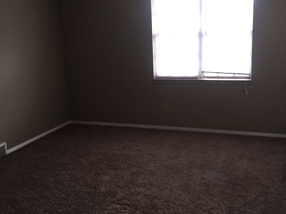 3rd image of 7128 NW Chapel Woods Ln