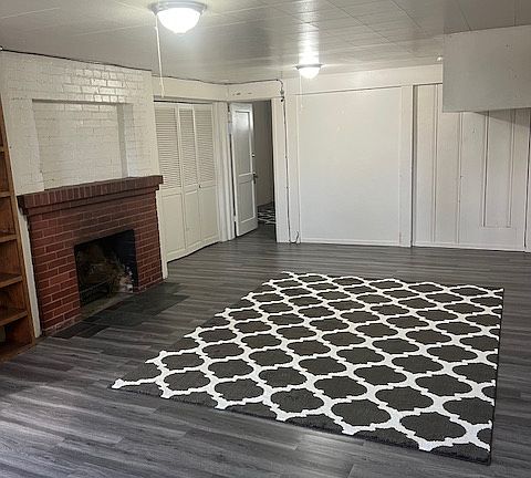 Huge Living area with new flooring. Large closet and bookshelf