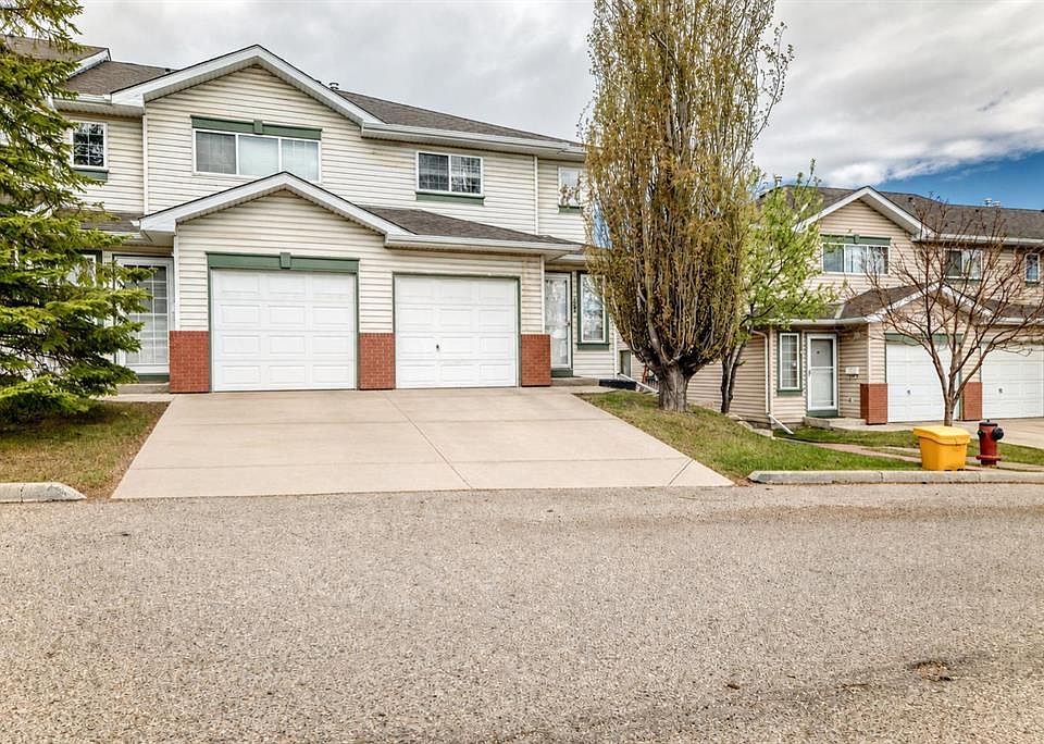 1st image of 152 Country Hills Vlg NW
