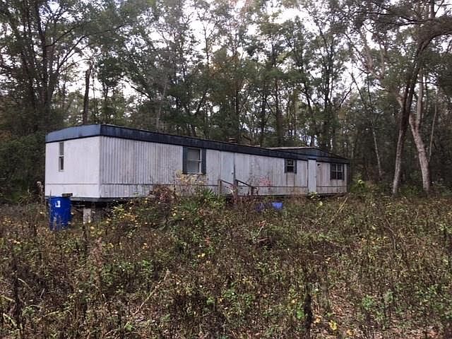 1st image of 457 NE 558th St
