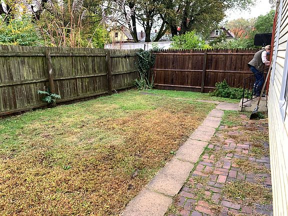 A small lawn sits at the back of the property.
