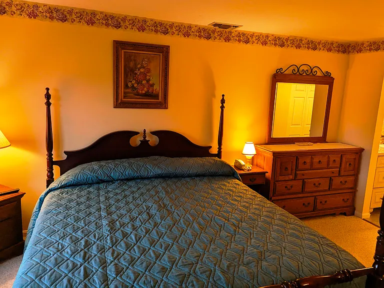 2nd floor master bedroom furnished with king-size bed