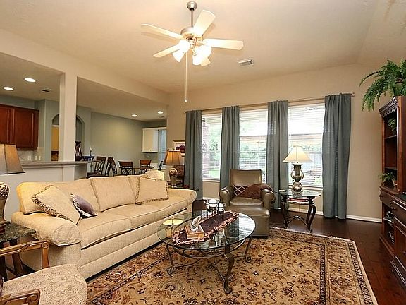 Spacious family room with gas log fireplace.