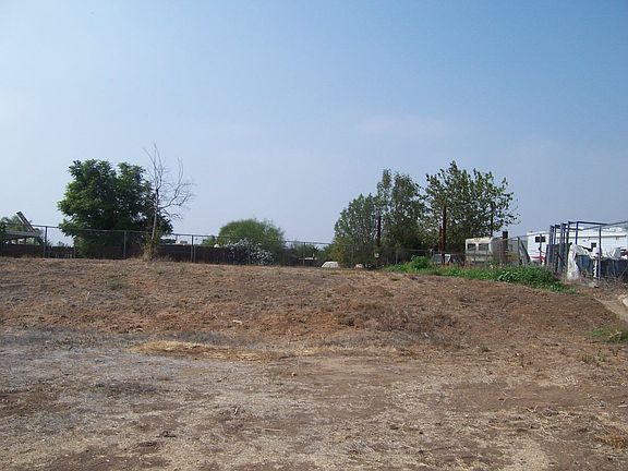 Large backyard with room for animals, toys, or triucks