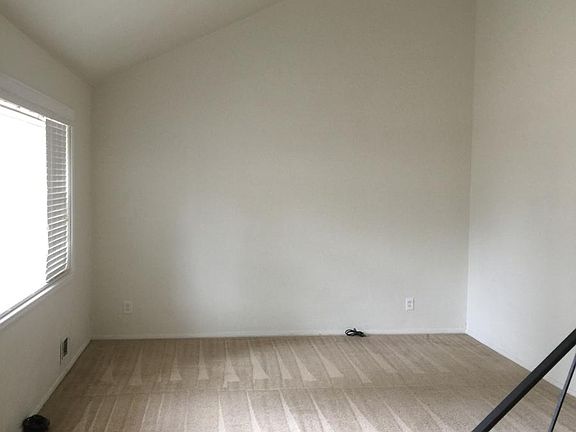 Living Room w/ Vaulted Ceiling