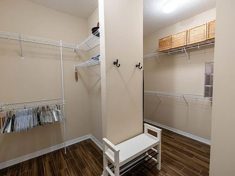1st of 2 Walk-in Closets in Primary Bathroom