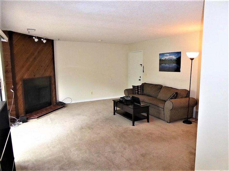 Livingroom and wood burning fireplace